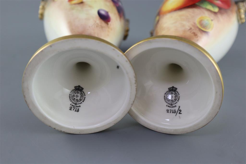 A pair of Royal Worcester fruit painted oviform vases, post-war, painted by J. Cook & P. Lynes, 21cm high